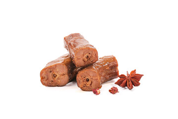 Spiced Meat Sausages with Star Anise and Chili Peppers on White Background