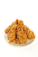 Golden Crispy Fried Chicken Pieces on White Plate - Restaurant Food Photography
