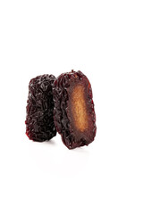Xinjiang Black Dried Jujube Fruits with Golden Interior on White Background