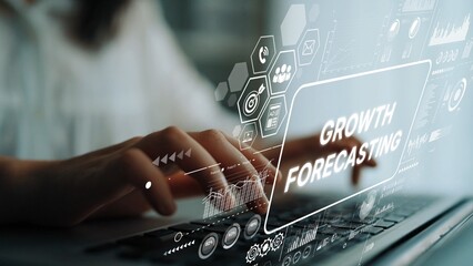 Professional Hands on Laptop with Growth Forecasting Graphics and Data Visualization for Business Planning. Asymptotic smart data analytic.