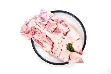 Raw Pork Trotters - Fresh Meat Cuts on Plate with Parsley