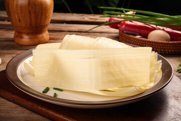 Fresh Rice Noodles with Green Onions and Red Chilies