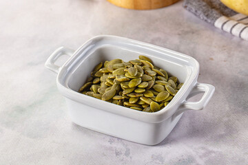Fresh green pumpkin peeled seeds