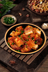 Crispy Roasted Pork Chinese Dish with Sesame and Green Onions