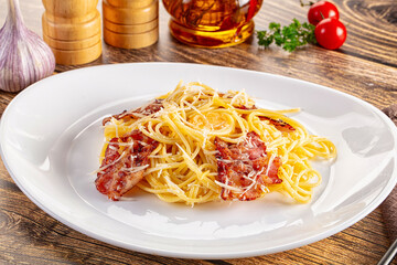 Italian classic spaghetti carbonara with bacon and egg