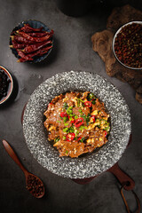 Traditional Chinese Beef Dish with Peppers and Sauce