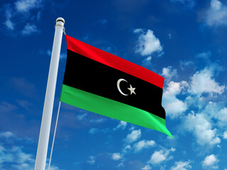 Realistic close-up of the Libya flag waving on a tall flagpole under a bright sky with soft scattered clouds, showing smooth wind motion, vivid colors, and a strong atmosphere of national pride.
