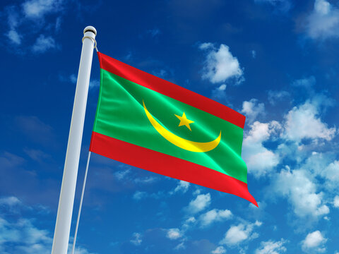 Realistic close-up of the Mauritania flag waving on a tall flagpole under a bright sky with scattered clouds, showing smooth wind motion, vivid colors, and a strong sense of national pride.
