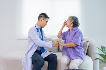 Fototapeta premium specialist orthopedic doctor in uniform taking medical history and physical examine a senior woman who suffer from hand joints pain