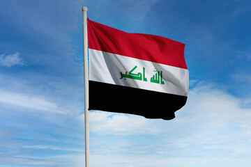 Realistic close-up of the Iraq flag waving on a tall flagpole under a bright sky with soft scattered clouds, showing smooth wind motion, vivid colors, and a clear, proud national atmosphere.
