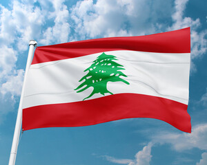 Realistic close-up of the Lebanon flag waving on a tall flagpole under a bright sky with soft scattered clouds, showing smooth wind motion, vivid colors, and a clear atmosphere of national pride.
