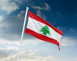 Realistic close-up of the Lebanon flag waving on a tall flagpole under a bright sky with soft scattered clouds, showing smooth wind motion, vivid colors, and a clear atmosphere of national pride.
