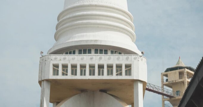 Sambodhi Chaithya stupa on elevated arches in the Fort area of Colombo, Sri Lanka