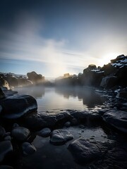 Fototapeta premium A secluded steaming mineral pool in winter