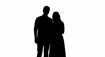 Silhouette of a couple standing together, showcasing their bond and presence.
