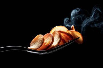 Hot Wavy Potato Crisp on Fork