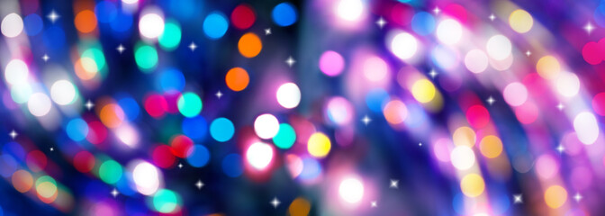 Christmas lights background bokeh, background with vibrant colorful blur lights with stars, sparkles, abstract colorful background