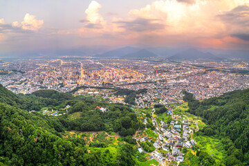 Nagano City, Japan with cityscape panorama at dusk from Asahi Mountain. 1867