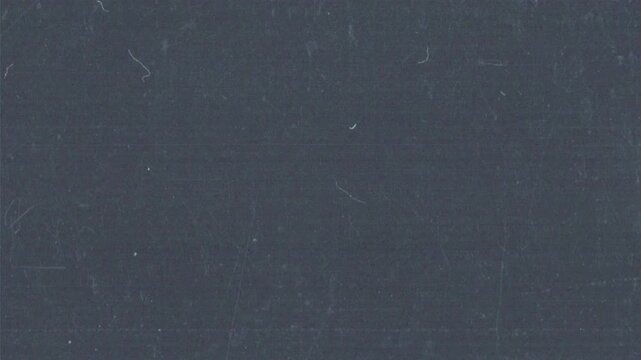 Vertical analog film grain loop with grind texture, dust and subtle imperfections. Ideal as an overlay or background for editors seeking authentic retro looks in vertical format.