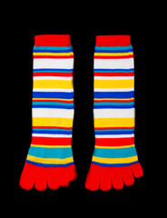 Multicolored socks on a black background.