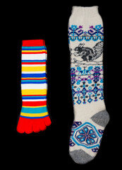Multicolored socks on a black background.