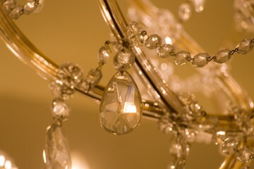 old historical crystal ceiling light in a palace