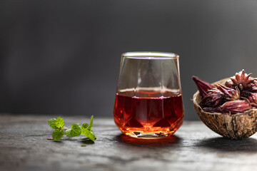 Hibiscus sabdariffa (roselle) fruits are bright red, tangy, antioxidant-rich calyces used in beverages and foods.
