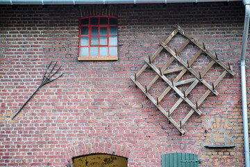 old wall and window with old tools