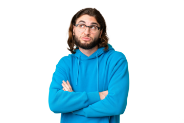 Young handsome man over isolated chroma key background making doubts gesture while lifting the shoulders