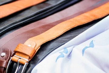Close up of brown and black leather straps