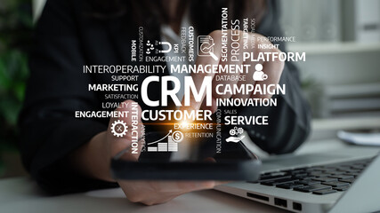 A business professional engages with a smartphone featuring various CRM concepts, highlighting essential aspects of customer management and marketing strategies. Tessel