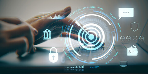 Person touching laptop screen with digital target interface and technology icons overlayed in a business and online network environment background.