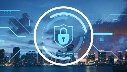 Digital padlock shield icon over cityscape at night representing cybersecurity, data protection, and virtual privacy technologies concept.