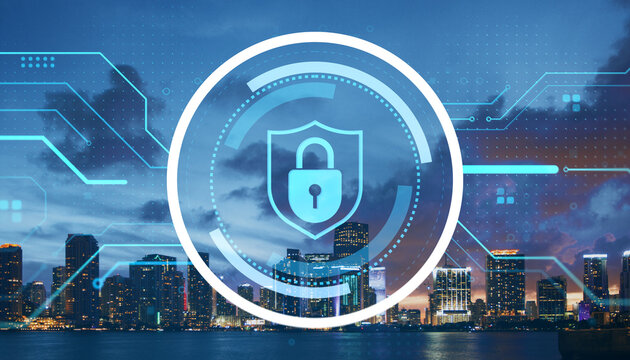 Digital padlock shield icon over cityscape at night representing cybersecurity, data protection, and virtual privacy technologies concept. - Powered by Adobe