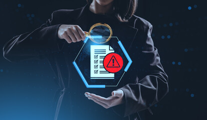 Businesswoman analyzing checklist with warning symbol using magn