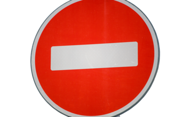 A detailed shot of a red and white sign with bold text and graphics