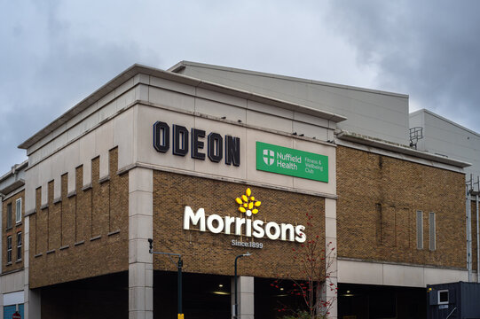 London, United Kingdom - November 24, 2025: A building with Odeon cinema and Morrisons supermarket signs.