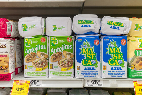 Villa de Alvarez, Colima, Mexico. October 20, 2025: A variety of Maseca corn flour products neatly arranged on a supermarket shelf.
