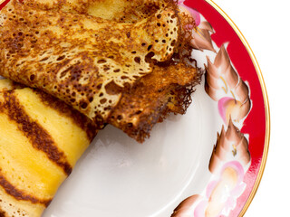 Pancakes lying on a plate.