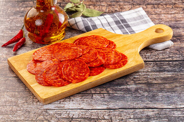 Spicy hot pepperoni sausages slices