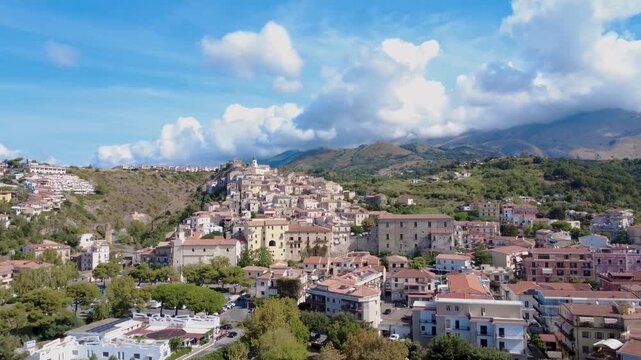 Breathtaking View of a Mediterranean Town Surrounded by Mountains on a Sunny Day. Scalea, Calabria, Italy