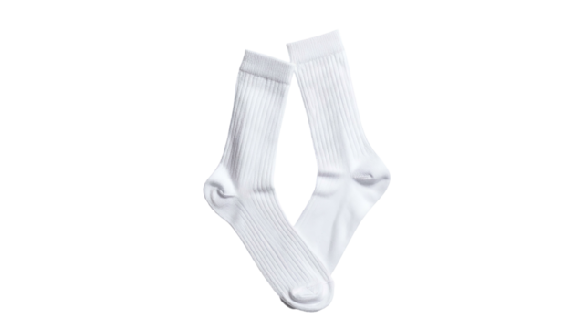 Two pristine white ribbed socks intersecting on a black backdrop