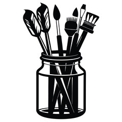Artist paintbrushes inside of glass jar create painting studio equipment idea