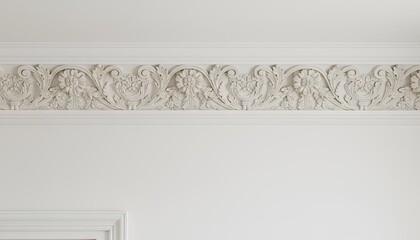 Intricate white plaster ceiling molding with floral ornate details on a clean wall providing architectural elegance
