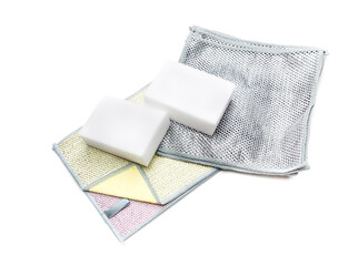 New washcloths and cleanser metal sponges on white background close-up