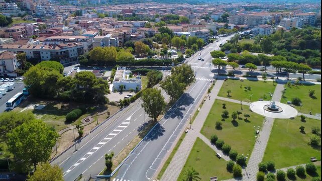 Beautiful Park View With Trees and Pathways in a Vibrant City Setting During Sunny Weather. Scalea, Calabria, Italy