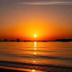 Serene sunset seascape capturing orange sky reflection over tranquil water surface scene