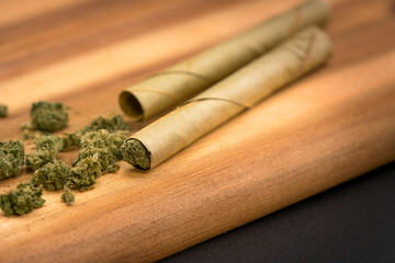 blunt cigar that has nature leaf and filled with cannabis. blunt marijuana tobacco leaf joint, marijuana blunt cigar, cannabis blunt cigarette prerolled Stick real photo white background	