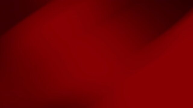 Dark red gradient background with soft light patterns suitable for modern and elegant designs, website backgrounds, and digital presentations.