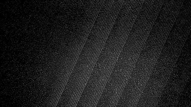 Abstract monochrome diagonal lines with grunge grainy texture background. Seamless looping geometric linear motion design. Video animation Ultra HD 4K 3840x2160
